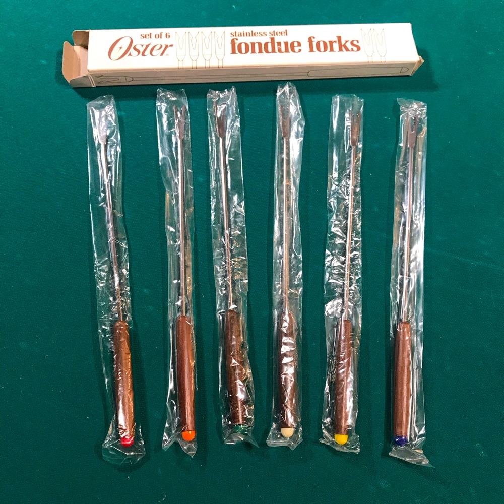 Vintage Oster fondue forks are stainless steel & have never been used